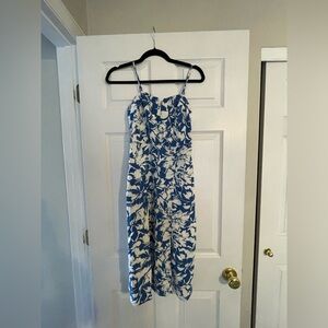 Blue and white floral maxi dress with adjustable straps from a boutique